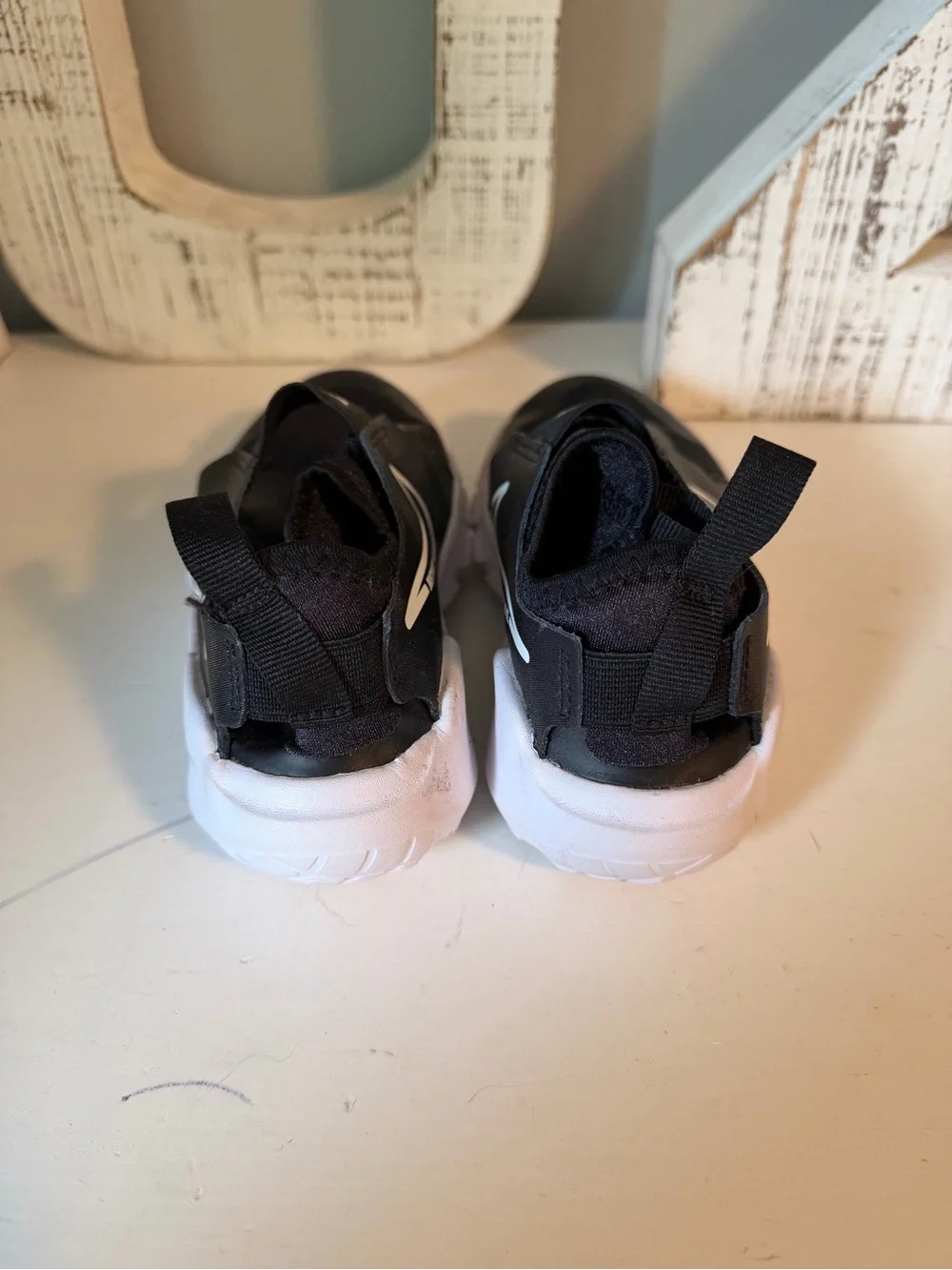 Nike Kids Black and White Slip-On Sneakers